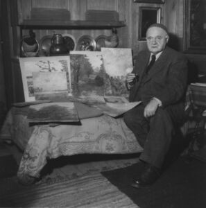 Der Schrifsteller, Maler und Architekt Rudolf Alexander Schröder (1878-1962) in Haus Sonnleiten (Lkr. Traunstein): Unter dem Vorsitz des Schriftstellers, Malers und Architekten wurde im Juli 1947 als eine Art Vorbote der späteren Gruppe 47 auf dem Gut der Ottonie Gräfin Degenfeld (geb. von Schwartz, 1882–1970) in Altenbeuern (Lkr. Rosenheim) eine Autoren-Tagung abgehalten. (Foto: 22.1.1953, Bayerische Staatsbibliothek, Bildarchiv)