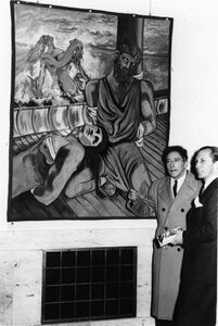 Jean Cocteau (1889-1963) und Hans Konrad Röthel (1909-1982) bei der Eröffnung der Ausstellung Jean Cocteau am 18. Januar 1952. Fotografie von Felicitas Timpe. (Bayerische Staatsbibliothek, Bildarchiv timp-010168)