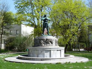 Der Rüdiger-Brunnen im Kaufbeurer Stadtteil Neugablonz wurde 1968 aus Gablonz a.d. Neiße (Jablonec) angekauft. Das Relief und die Bronzefigur des Rüdiger von Bechelaren - eine Gestalt der Nibelungensage - fertigte der aus Böhmen stammende Bildhauer Franz Metzner (1870-1919). (Foto von VanGore lizensiert durch CC0 1.0 via Wikimedia Commons)