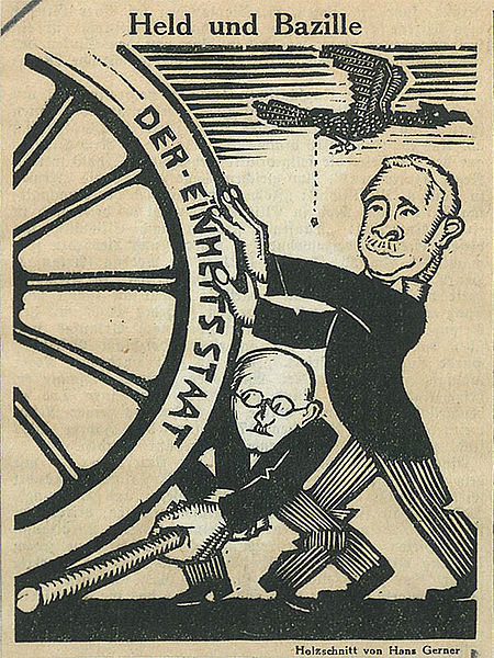 Datei:Karikatur Held und Bazille.jpg