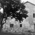 Steinbau/Bohlenstube, flachgeneigtes Dach, 1299 d, ursprünglich Matting an der Donau, Wolfgangstraße 13 (abgebrochen), Fotografie Konrad Bedal, 1974. (Freilandmuseum Bad Windsheim)